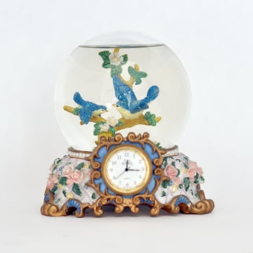 Music box with bluebirds in snowglobe.