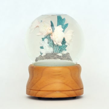 Music box with angelfish in snowglobe.